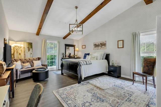2600 Clanton Rd, Lawrenceburg, TN 38464 - bedroom featuring a chandelier, wallpapered walls, and wood finished floors