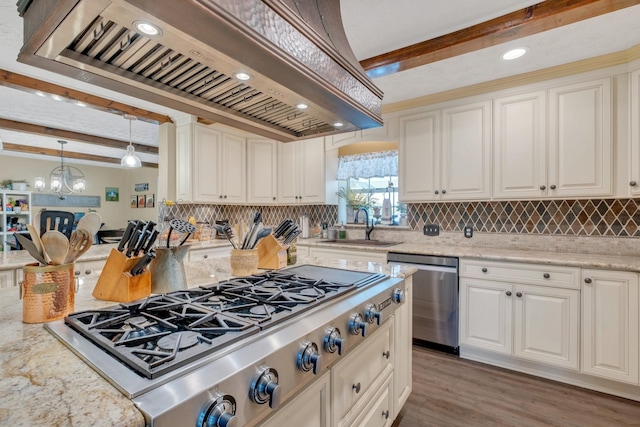 2600 Clanton Rd, Lawrenceburg, TN 38464 - kitchen with appliances with stainless steel finishes, beam ceiling, premium range hood, backsplash, and light stone countertops