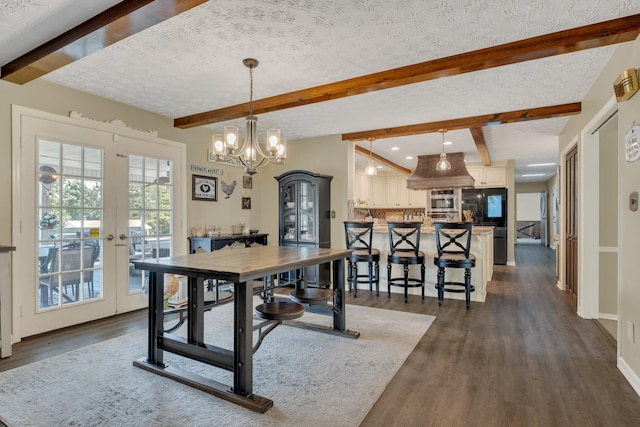 2600 Clanton Rd, Lawrenceburg, TN 38464 - dining space with dark wood-style floors, beam ceiling, french doors, a chandelier, and a textured ceiling