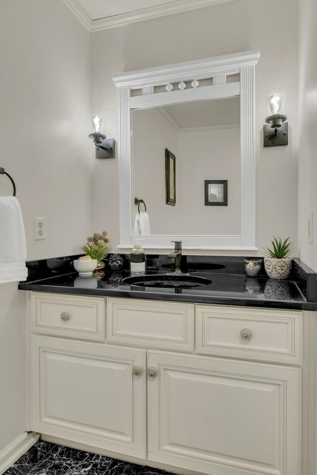 2600 Clanton Rd, Lawrenceburg, TN 38464 - bathroom with vanity, ornamental molding, and marble finish flooring