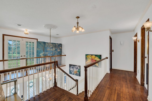 2600 Clanton Rd, Lawrenceburg, TN 38464 - corridor with a chandelier, healthy amount of natural light, an upstairs landing, and hardwood / wood-style floors