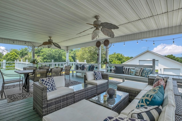2600 Clanton Rd, Lawrenceburg, TN 38464 - view of patio with an outdoor living space, a ceiling fan, and outdoor dining space
