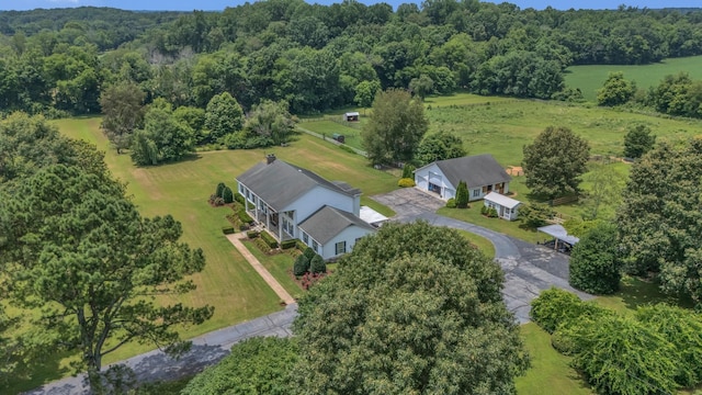 2600 Clanton Rd, Lawrenceburg, TN 38464 - aerial view of property and surrounding area with a heavily wooded area