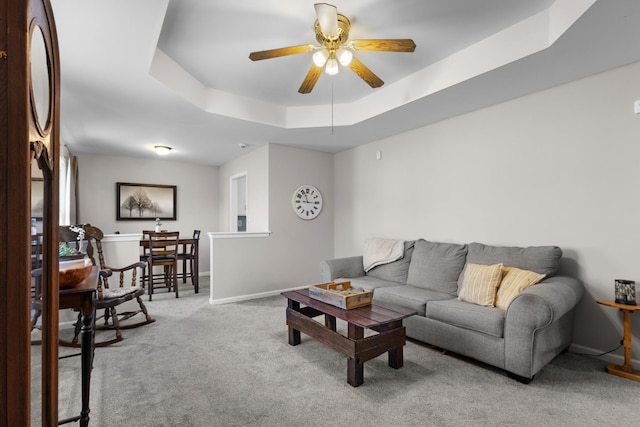 739 Carmack Ct, Clarksville, TN 37042 - carpeted living area featuring ceiling fan and a raised ceiling