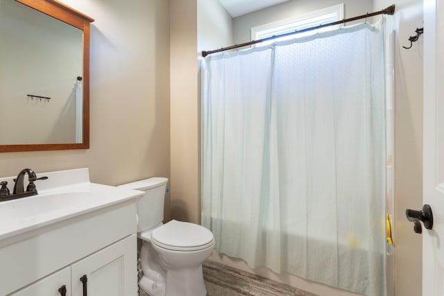 3215 Church St, Burns, TN 37029 - full bath with vanity, shower / tub combo with curtain, and wood finished floors
