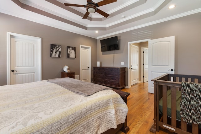 3215 Church St, Burns, TN 37029 - bedroom with ornamental molding, a raised ceiling, light wood finished floors, recessed lighting, and ceiling fan