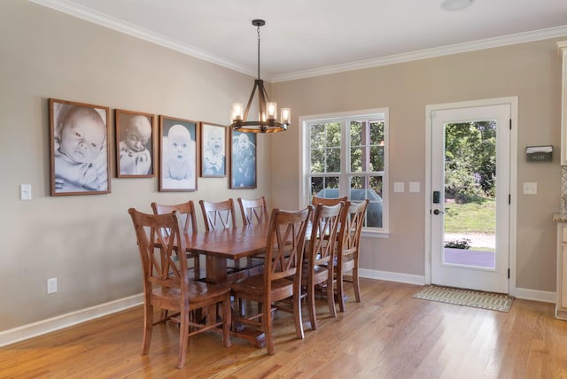 3215 Church St, Burns, TN 37029 - dining area with a chandelier, light wood-style flooring, and ornamental molding