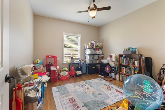 3215 Church St, Burns, TN 37029 - playroom with wood finished floors and a ceiling fan