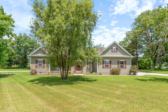 3215 Church St, Burns, TN 37029 - view of front facade with crawl space and a front lawn