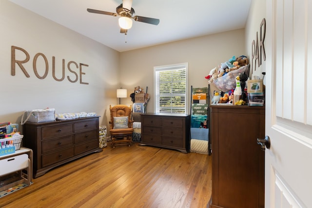 3215 Church St, Burns, TN 37029 - bedroom featuring light wood finished floors and ceiling fan