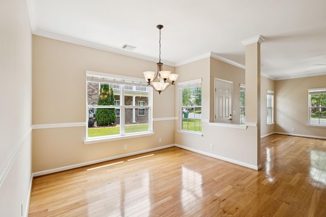 2025 Morrison Ave, Spring Hill, TN 37174 - empty room with wood finished floors, a chandelier, and ornamental molding