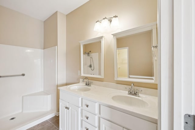 2025 Morrison Ave, Spring Hill, TN 37174 - bathroom featuring double vanity, tile patterned floors, and a shower