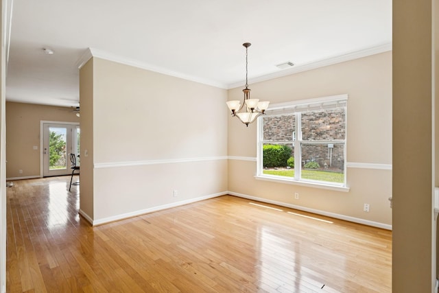 2025 Morrison Ave, Spring Hill, TN 37174 - unfurnished room with a chandelier, light wood-type flooring, ornamental molding, and ceiling fan