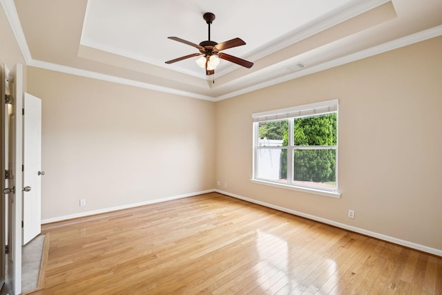 2025 Morrison Ave, Spring Hill, TN 37174 - spare room with a raised ceiling, light wood-type flooring, ornamental molding, and ceiling fan