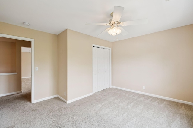 2025 Morrison Ave, Spring Hill, TN 37174 - unfurnished bedroom with carpet, a closet, and a ceiling fan