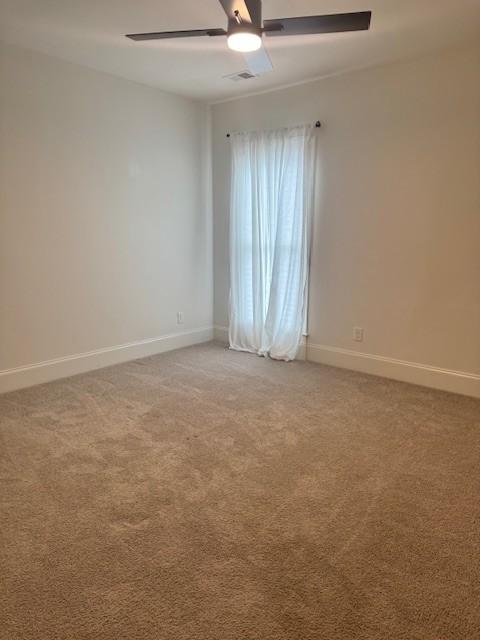 6060 Pasquo Rd, Nashville, TN 37221 - empty room featuring ceiling fan and light colored carpet