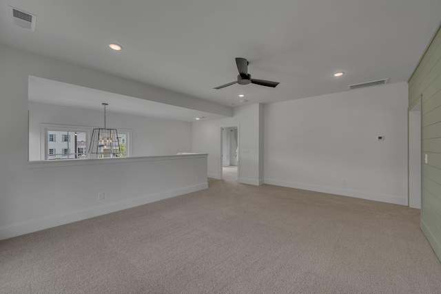 6060 Pasquo Rd, Nashville, TN 37221 - unfurnished room featuring a ceiling fan, light carpet, a chandelier, and recessed lighting