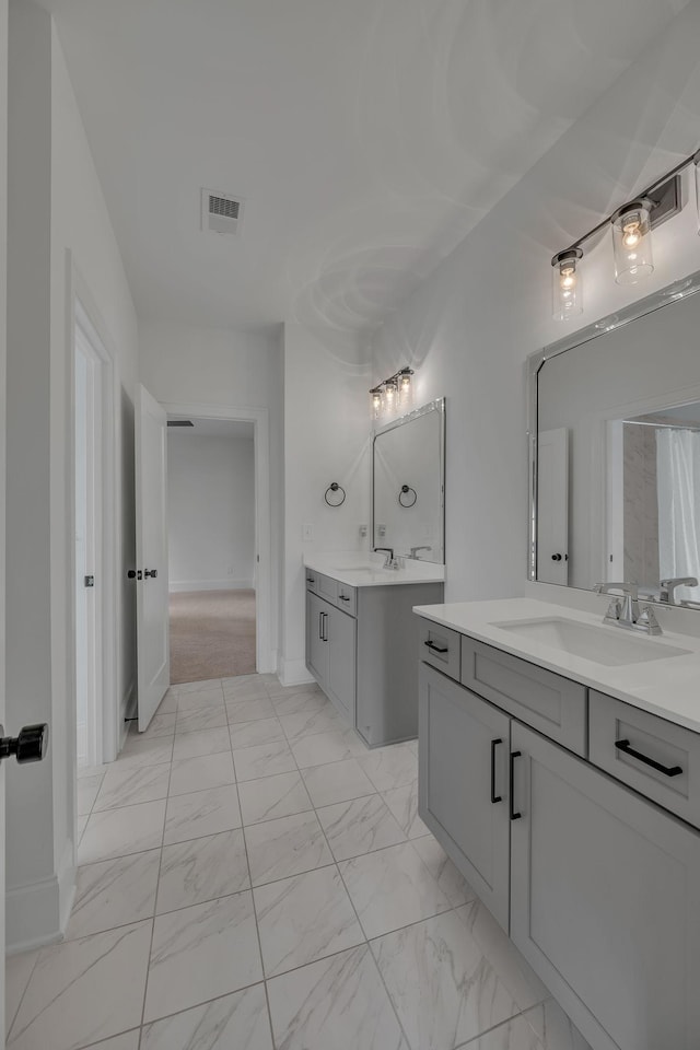 6060 Pasquo Rd, Nashville, TN 37221 - full bath featuring two vanities and marble finish floors