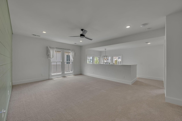 6060 Pasquo Rd, Nashville, TN 37221 - empty room featuring ceiling fan, light carpet, a chandelier, and recessed lighting