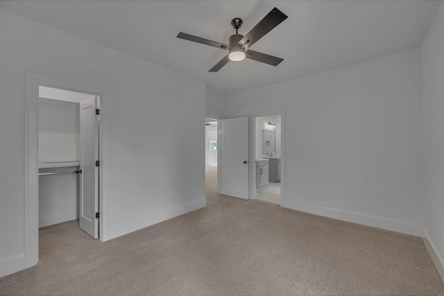 6060 Pasquo Rd, Nashville, TN 37221 - unfurnished bedroom with light colored carpet, a spacious closet, ensuite bathroom, and a closet