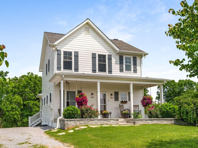 7811 Lampley Rd, Primm Springs, TN 38476 - view of front of home featuring covered porch, a front lawn, and a shingled roof