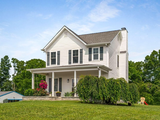 7811 Lampley Rd, Primm Springs, TN 38476 - view of front of home with a chimney, a front lawn, a shingled roof, and a porch