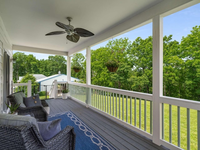 7811 Lampley Rd, Primm Springs, TN 38476 - wooden deck with ceiling fan, a yard, and view of scattered trees
