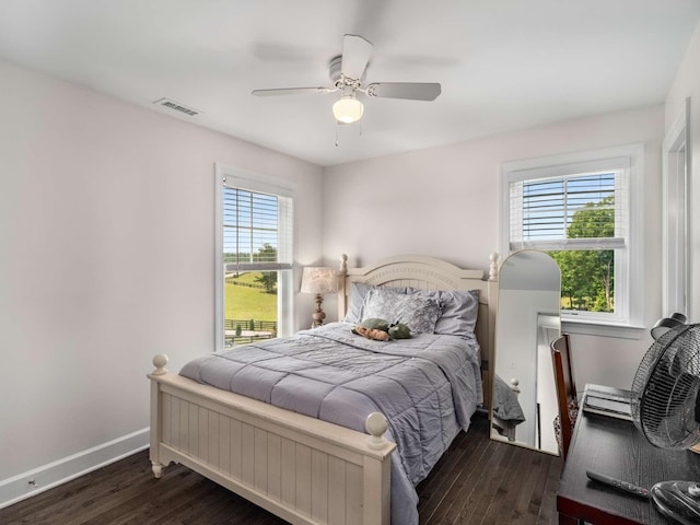 7811 Lampley Rd, Primm Springs, TN 38476 - bedroom featuring dark wood finished floors and a ceiling fan