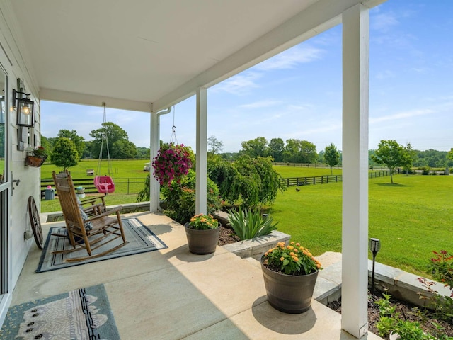 7811 Lampley Rd, Primm Springs, TN 38476 - covered porch with a view of rural / pastoral area