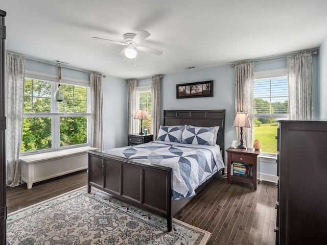 7811 Lampley Rd, Primm Springs, TN 38476 - bedroom with dark wood-style flooring and ceiling fan