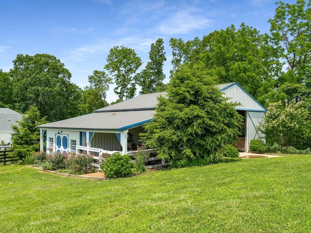 7811 Lampley Rd, Primm Springs, TN 38476 - view of front of property with a front lawn and board and batten siding