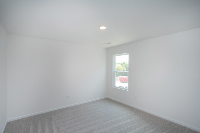 458 Jet Stream Dr, La Vergne, TN 37086 - empty room featuring light carpet and recessed lighting