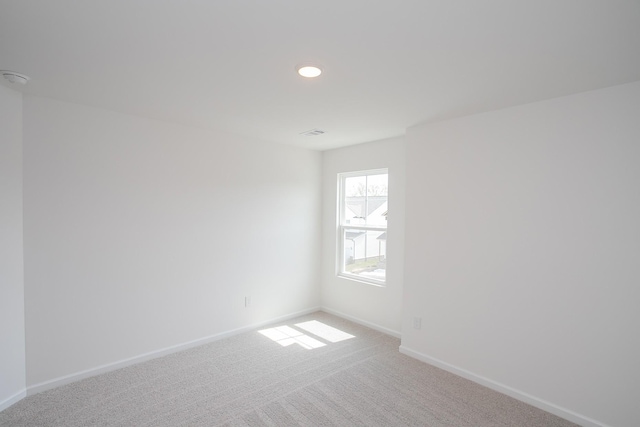 458 Jet Stream Dr, La Vergne, TN 37086 - empty room featuring carpet flooring, recessed lighting, and a smoke detector