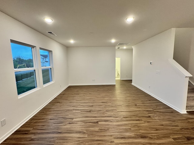 458 Jet Stream Dr, La Vergne, TN 37086 - empty room with recessed lighting, dark wood-type flooring, and stairway