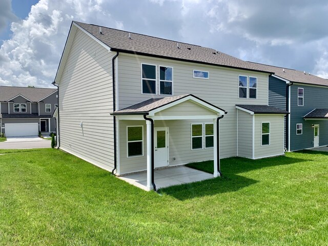 458 Jet Stream Dr, La Vergne, TN 37086 - rear view of house with a patio and a lawn