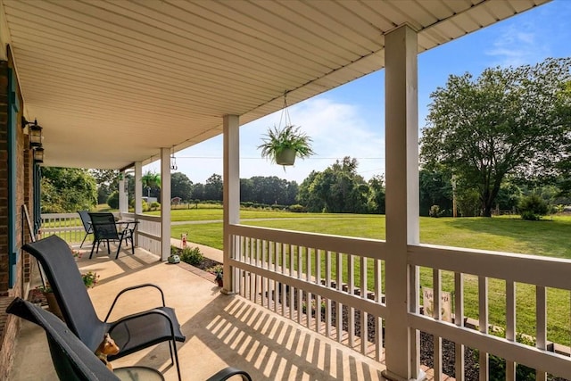 5455 Bales Rd, Cunningham, TN 37052 - porch with a lawn and view of wooded area