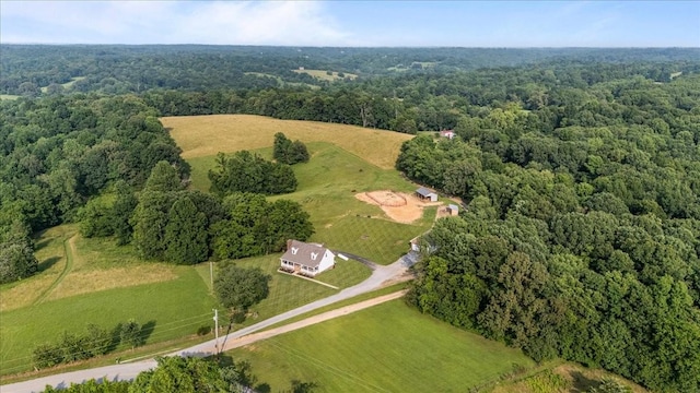 5455 Bales Rd, Cunningham, TN 37052 - aerial view of property and surrounding area with a heavily wooded area and rural landscape