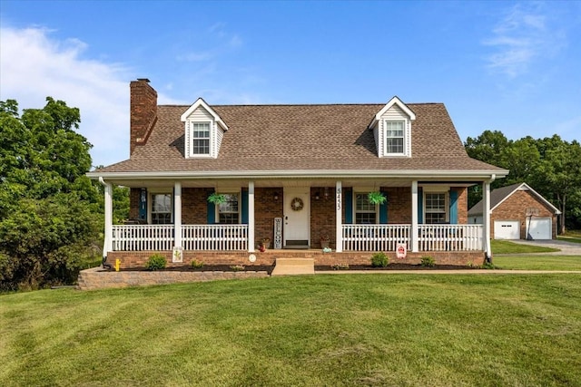 5455 Bales Rd, Cunningham, TN 37052 - cape cod home featuring a porch, a chimney, a garage, brick siding, and a front lawn