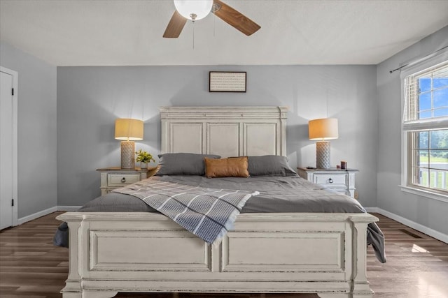 5455 Bales Rd, Cunningham, TN 37052 - bedroom with wood finished floors and ceiling fan