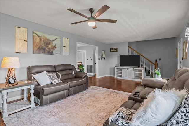 5455 Bales Rd, Cunningham, TN 37052 - living area with a ceiling fan, stairway, and wood finished floors