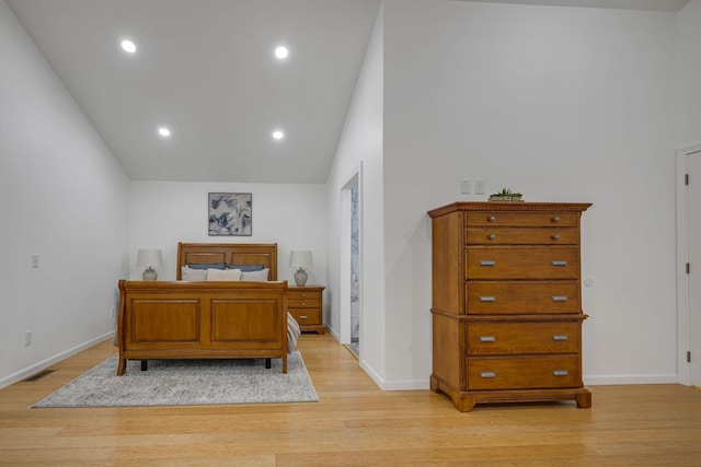 1697 Curtis Chapel Rd, Mc Ewen, TN 37101 - bedroom featuring lofted ceiling, light wood-style flooring, and recessed lighting