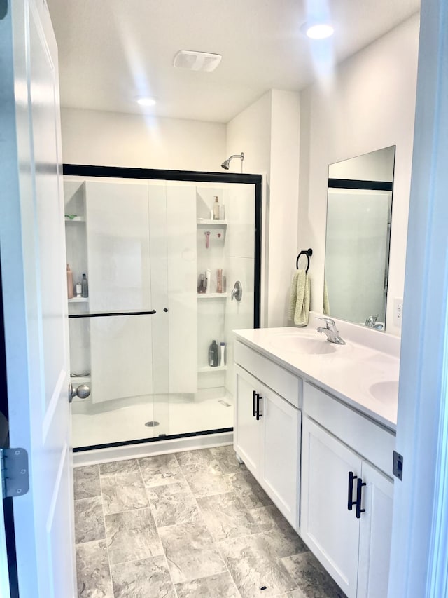 143 Belle Way, Athens, TN 37303 - full bathroom featuring double vanity and a shower stall