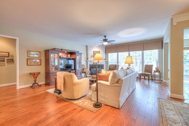 507 Bugler Rd, Mount Juliet, TN 37122 - living room featuring ceiling fan, light wood-style flooring, and a glass covered fireplace