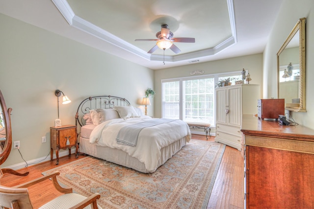 507 Bugler Rd, Mount Juliet, TN 37122 - bedroom featuring a raised ceiling, light wood-style flooring, ornamental molding, and ceiling fan