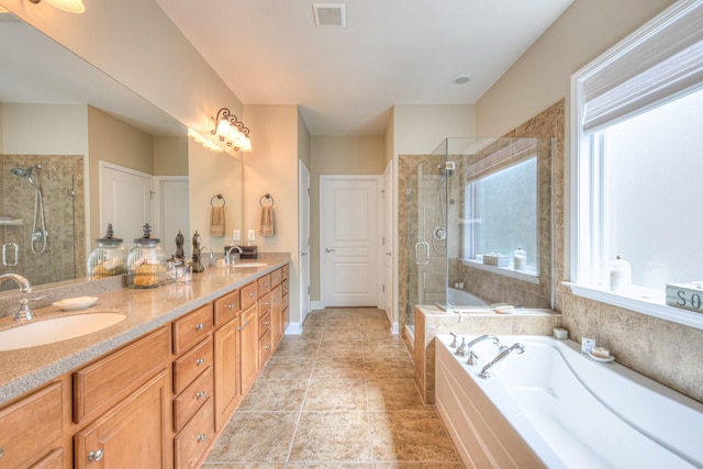 507 Bugler Rd, Mount Juliet, TN 37122 - full bath featuring a garden tub, healthy amount of natural light, double vanity, and a stall shower