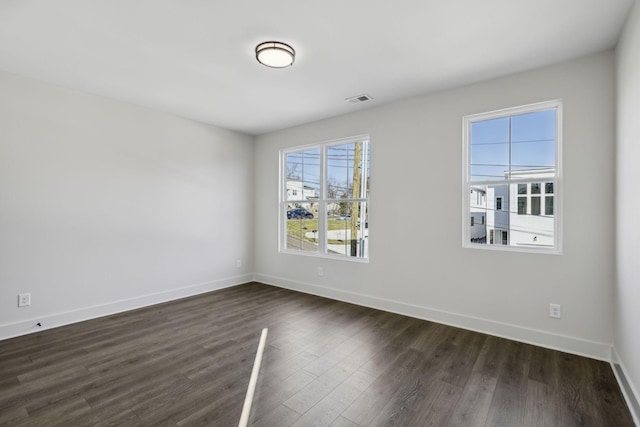 1734B Kellow St, Nashville, TN 37208 - spare room with dark wood-style flooring and baseboards