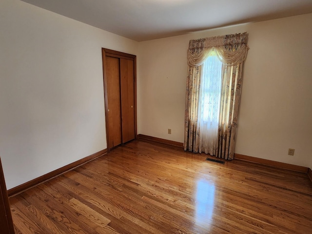 1036 Old Bottom Rd, Lafayette, TN 37083 - spare room featuring wood finished floors and baseboards