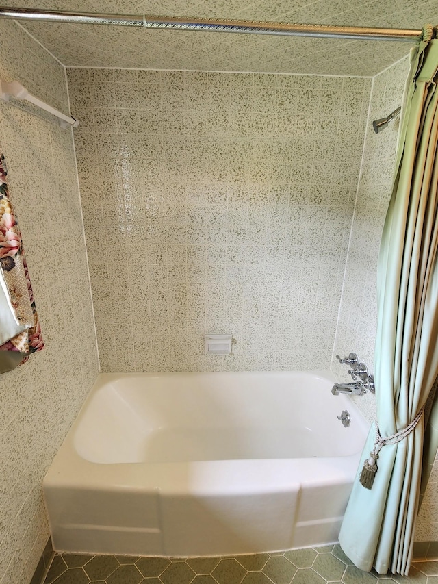1036 Old Bottom Rd, Lafayette, TN 37083 - bathroom featuring tile patterned floors and shower / bathtub combination