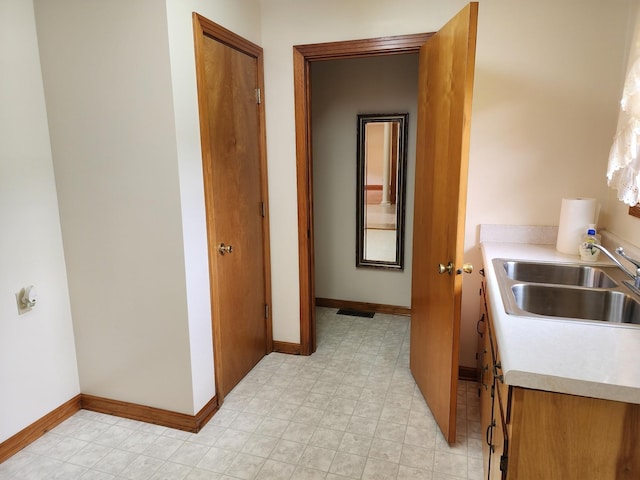 1036 Old Bottom Rd, Lafayette, TN 37083 - hall featuring a sink and baseboards