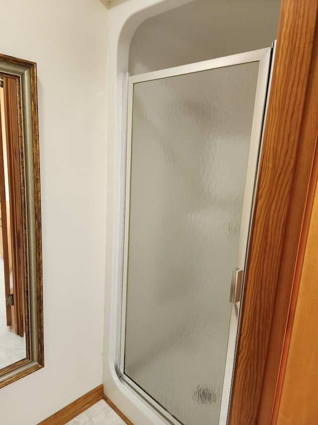 1036 Old Bottom Rd, Lafayette, TN 37083 - bathroom with a stall shower and baseboards